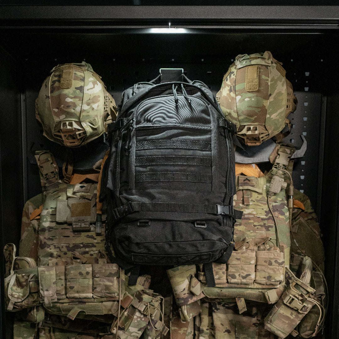 Thin Air Gear tactical backpack with MOLLE webbing displayed on military equipment for field operations